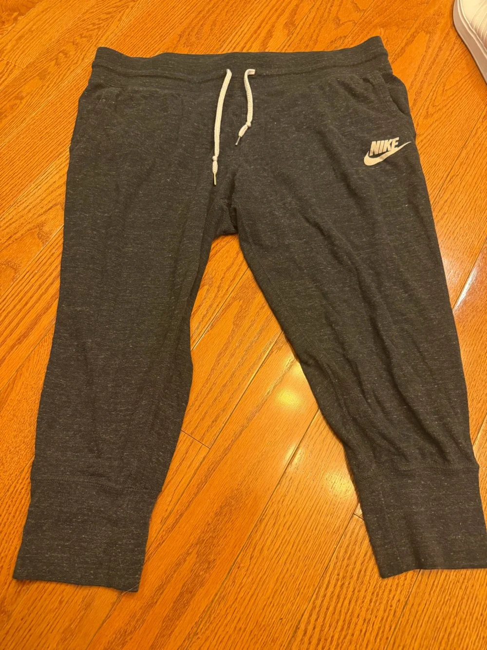 Nike Charcoal Gray Sweatpants with White Logo Tag Women’s 3/4 length